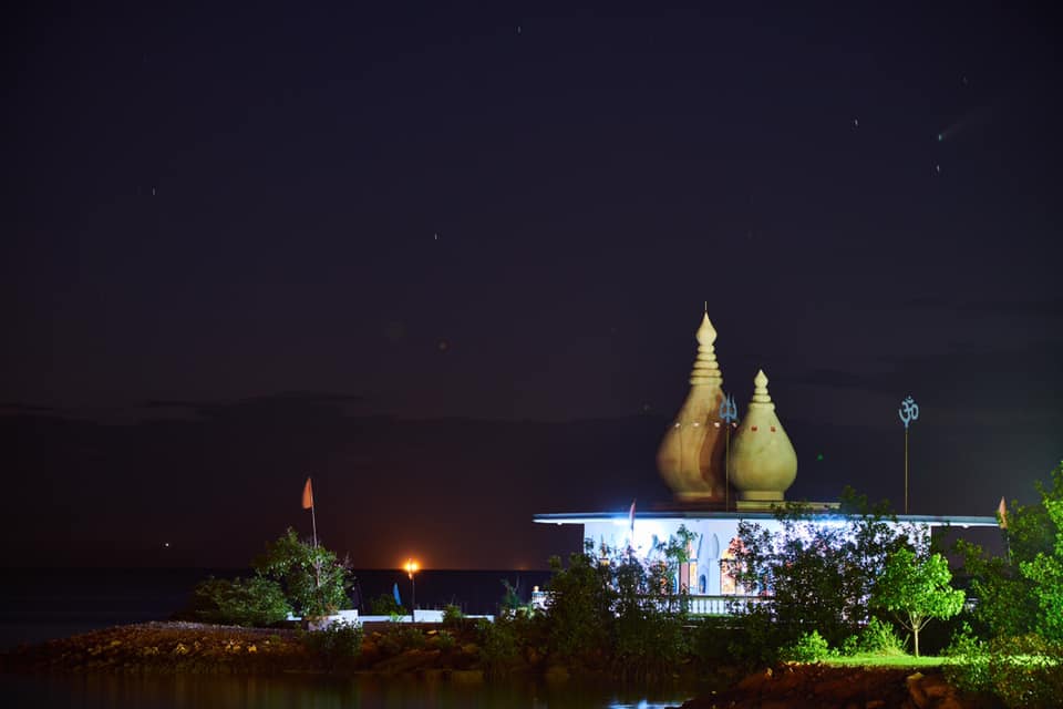 NEOWISE spotted from the Temple in the Sea, Waterloo Trinidad by Kevin Huggins, seen in the top right corner of the image.