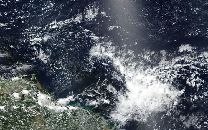 A tropical disturbance east of Trinidad and Tobago on August 15th, 2018 during the 2018 Hurricane Season. This disturbance was designated Invest 99L, which eventually dissipated as it traversed the Southern Windwards. Image: NASA Worldview/Visible Infrared Imaging Radiometer Suite (VIIRS)