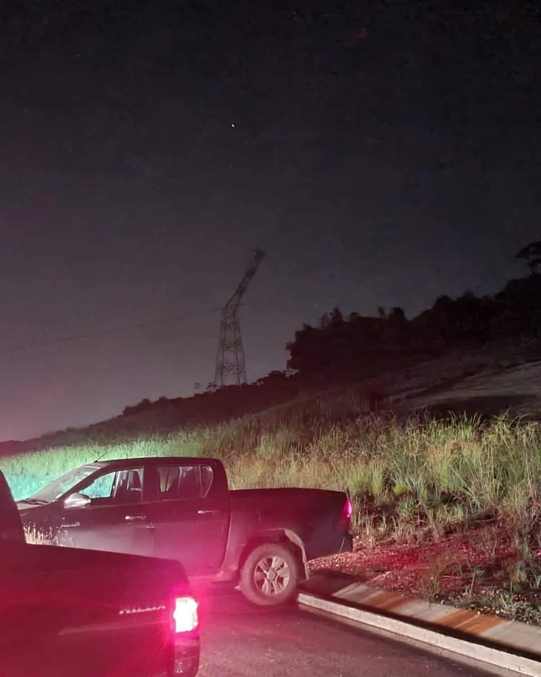Partially collapsed 220-KV electricity transmission tower that has triggered sporadic outages across Trinidad on Tuesday, August 16th, 2022.