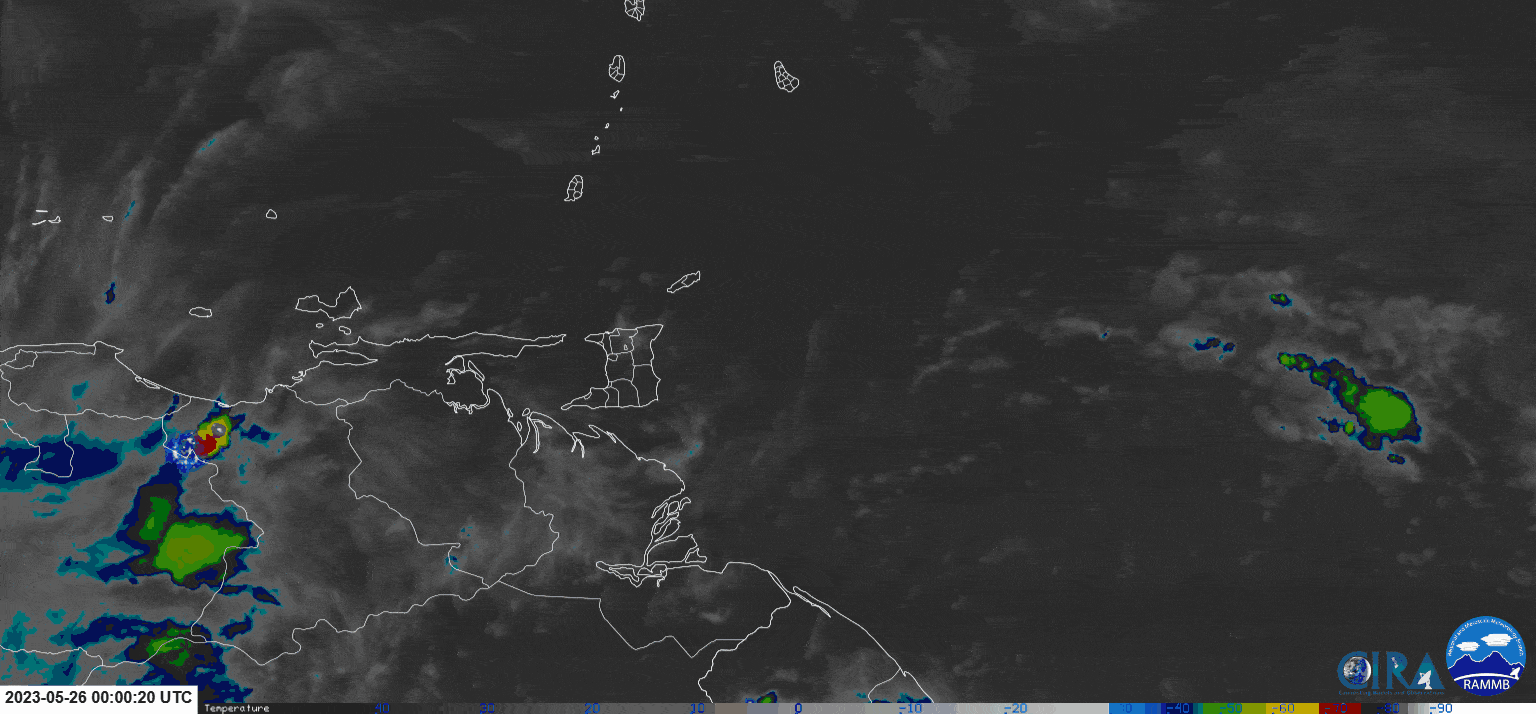 The axis of Tropical Wave 04 along 60W on Friday, May 26th, 2023, with showers and thunderstorms affecting parts of Trinidad and Tobago, with the bulk of cloudiness, showers, and thunderstorms still east of the area (CIRA/RAMMB)
