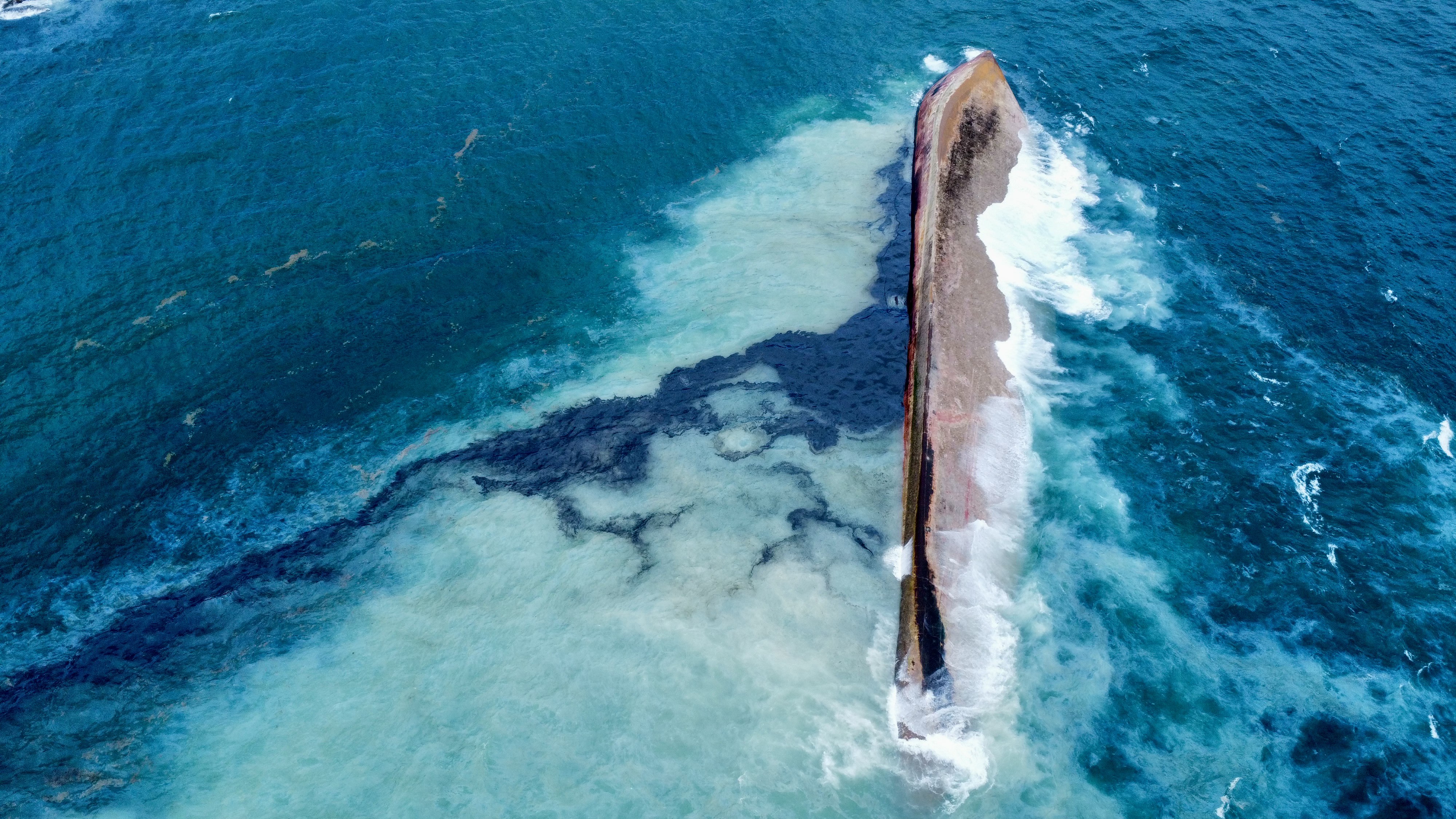 A capsized ship 150 meters off Cove, Tobago, spilling oil into Tobago's waters. The Tobago House of Assembly Chief Secretary Farley Augustine has indicated the disaster level will be moving to tier three, days after the oil began washing up on Tobago's shores.
