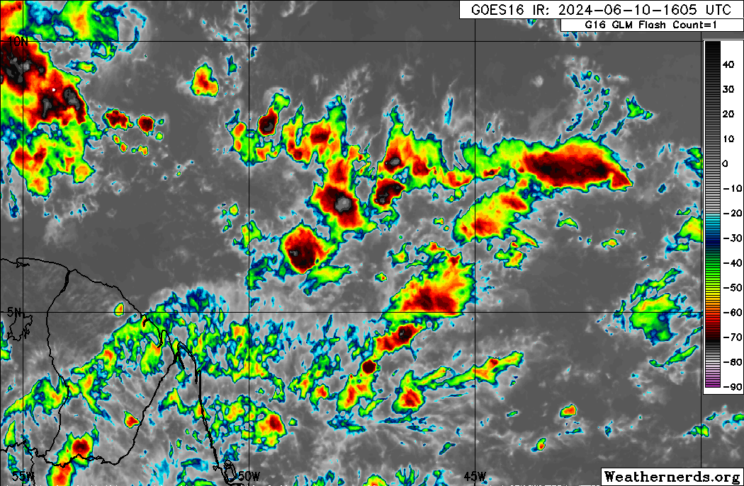 A low-level trough, embedded within the Intertropical Convergence Zone on Monday, June 10th, 2024, producing scattered showers and thunderstorms with widespread cloudiness.