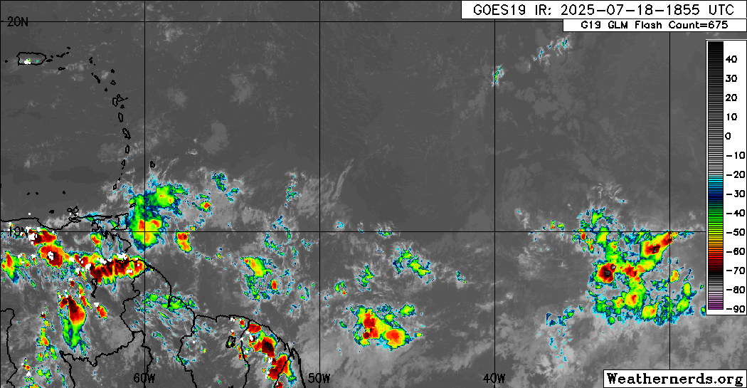 Tropical Wave 18 in the Central Tropical Atlantic on Friday evening, with scattered showers and isolated thunderstorms.